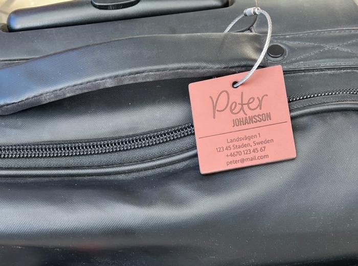 Personlig bagagetag i läder